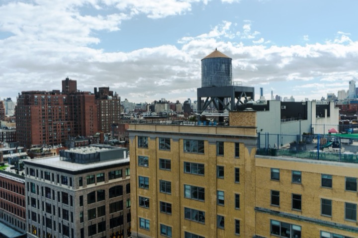 New York rooftops with a wooden water tower