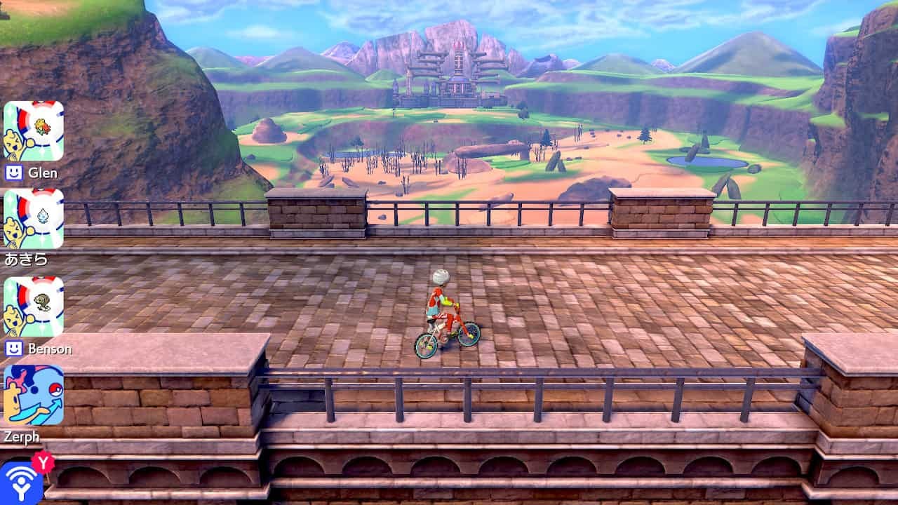 The player cycling across a bridge in the Wild Area